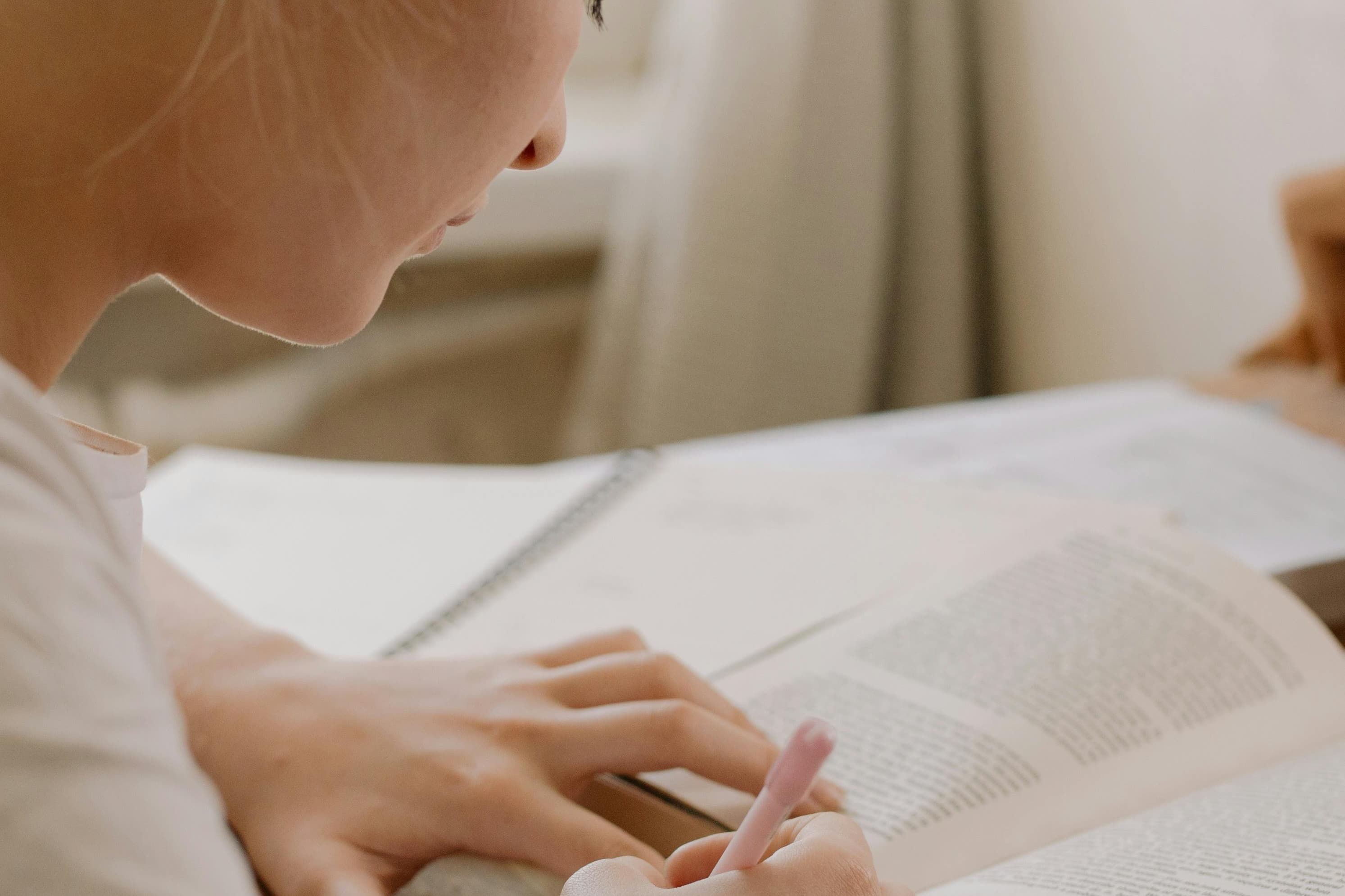 A woman reading a book.